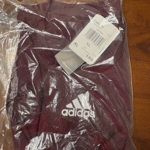Brand new adidas shirts still in the bag